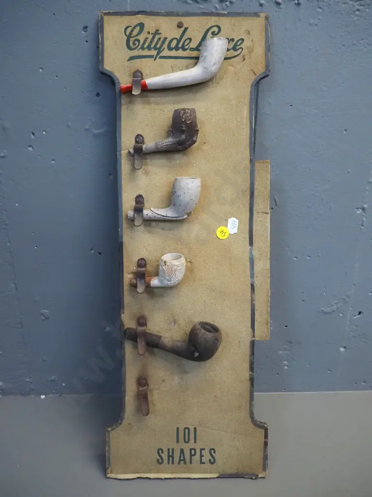 clay pipes and part pipes on vintage pipe retail display board and a vintage timber and brass parallel rule L610 Image 1++