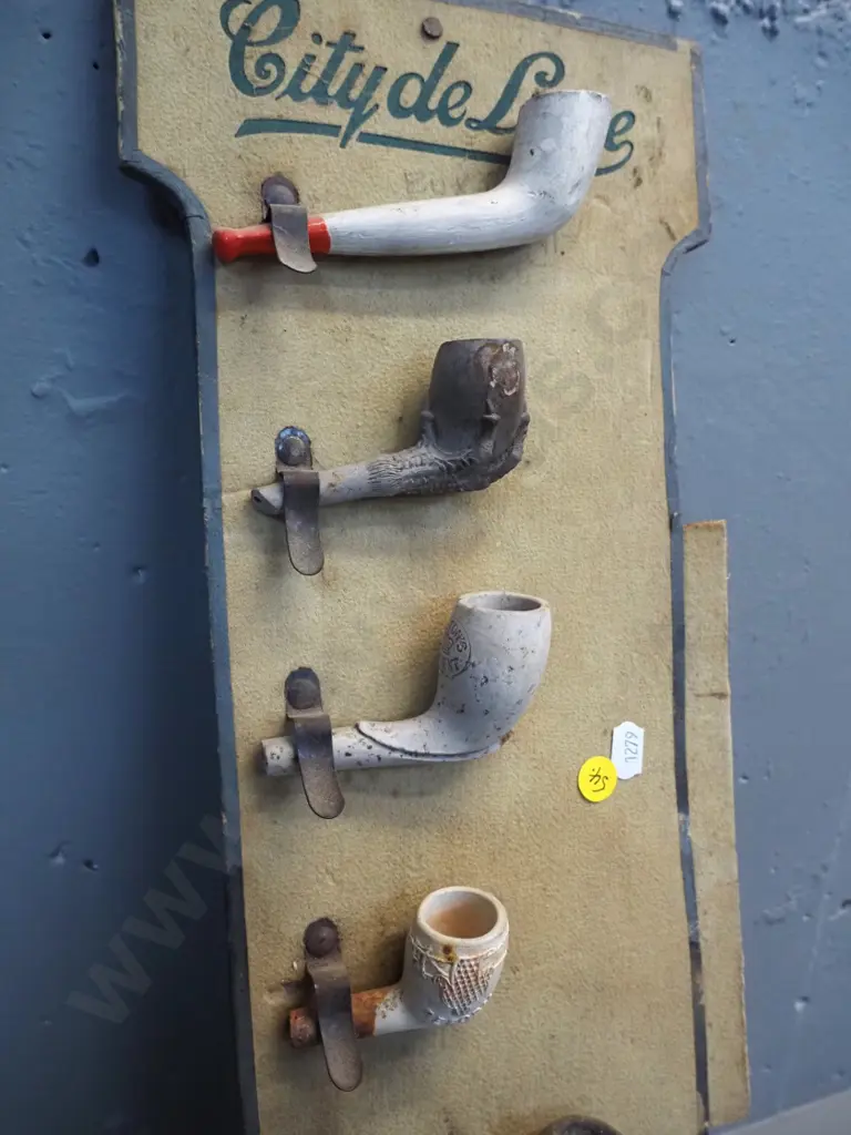 clay pipes and part pipes on vintage pipe retail display board and a vintage timber and brass parallel rule L610 Image 1++