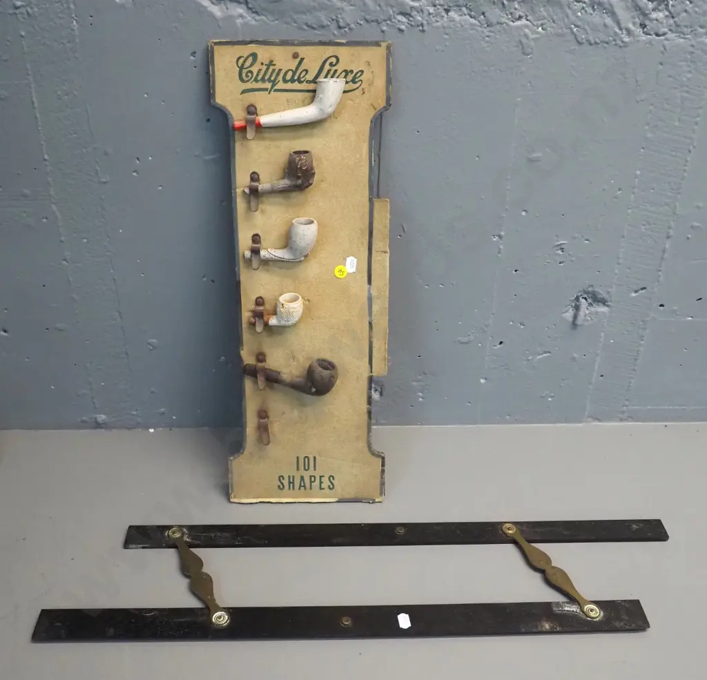 clay pipes and part pipes on vintage pipe retail display board and a vintage timber and brass parallel rule L610 Image 1++