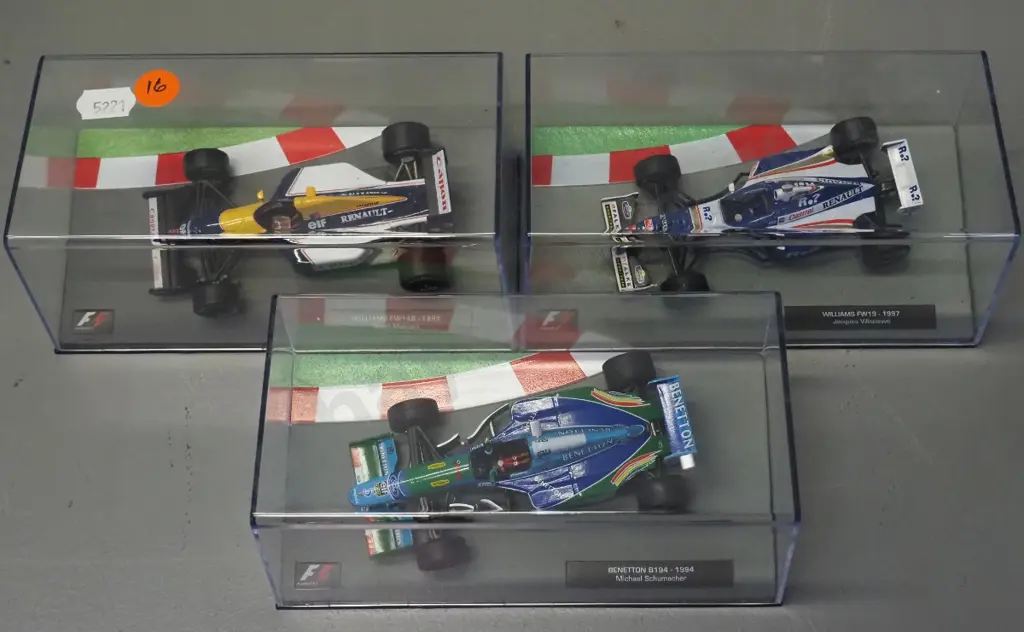3 die-cast 1:43 scale Formula 1 racing cars - 1992 Nigel Mansell, 1994 Michael Schumacher, 1997 Jacques Villeneuve Image 1++