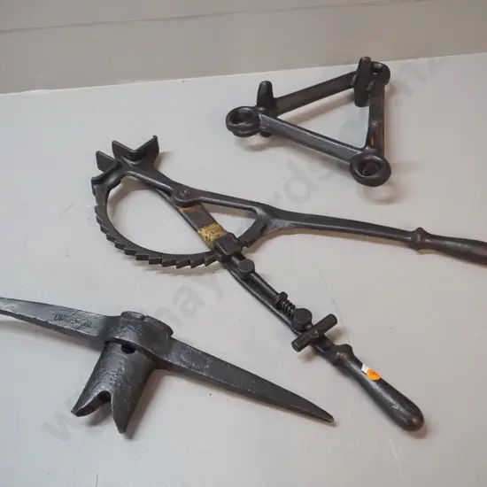 3 vintage cast iron items - Hardy Pick 'Universal' pick-axe head, ratchet spring loaded spreader L530 & triangular item