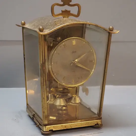 restorer's Schatz anniversary / carriage clock with brass case, cut glass panels, pendulum support needs
