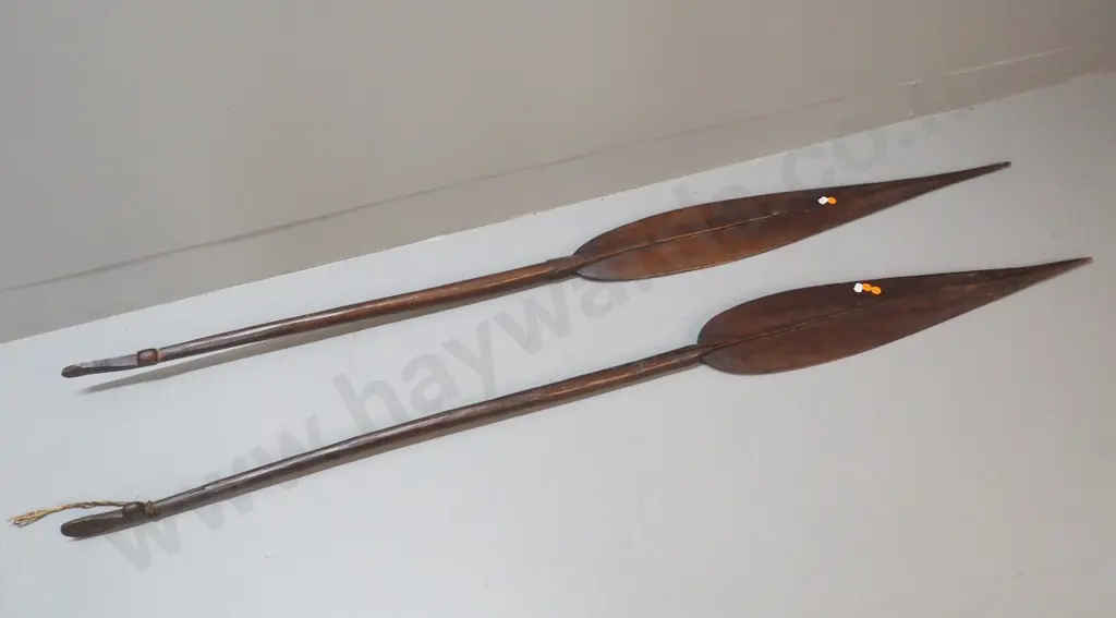 pair of vintage carved wooden paddles - longer one is L-1560, shorted one has cracks in handle Image 1++