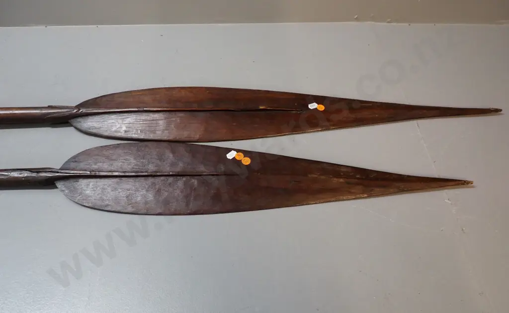 pair of vintage carved wooden paddles - longer one is L-1560, shorted one has cracks in handle Image 1++