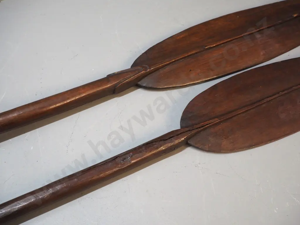 pair of vintage carved wooden paddles - longer one is L-1560, shorted one has cracks in handle Image 1++