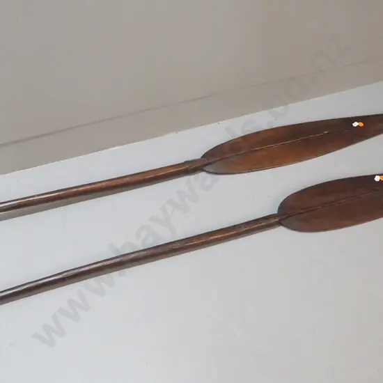 pair of vintage carved wooden paddles - longer one is L-1560, shorted one has cracks in handle