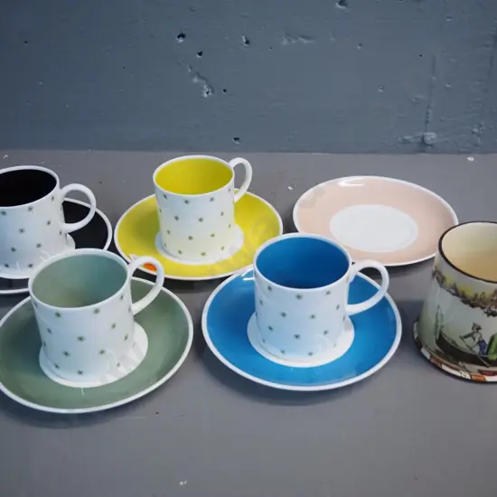 4 various coloured Susie Cooper coffee cans & saucers w/spare saucer & Royal Doulton Venetian scene pot