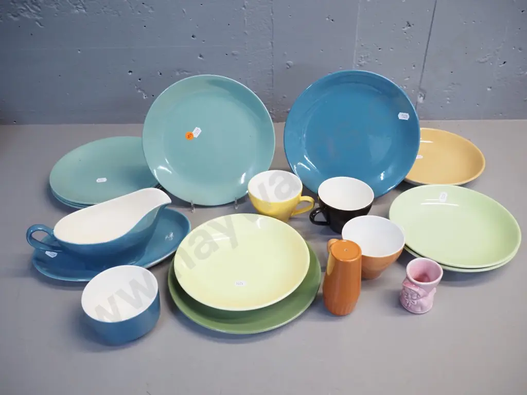 assorted Crown Lynn colour glaze items including luncheon plates, cups, gravy boat & saucer, etc plus child's egg cup Image 1++