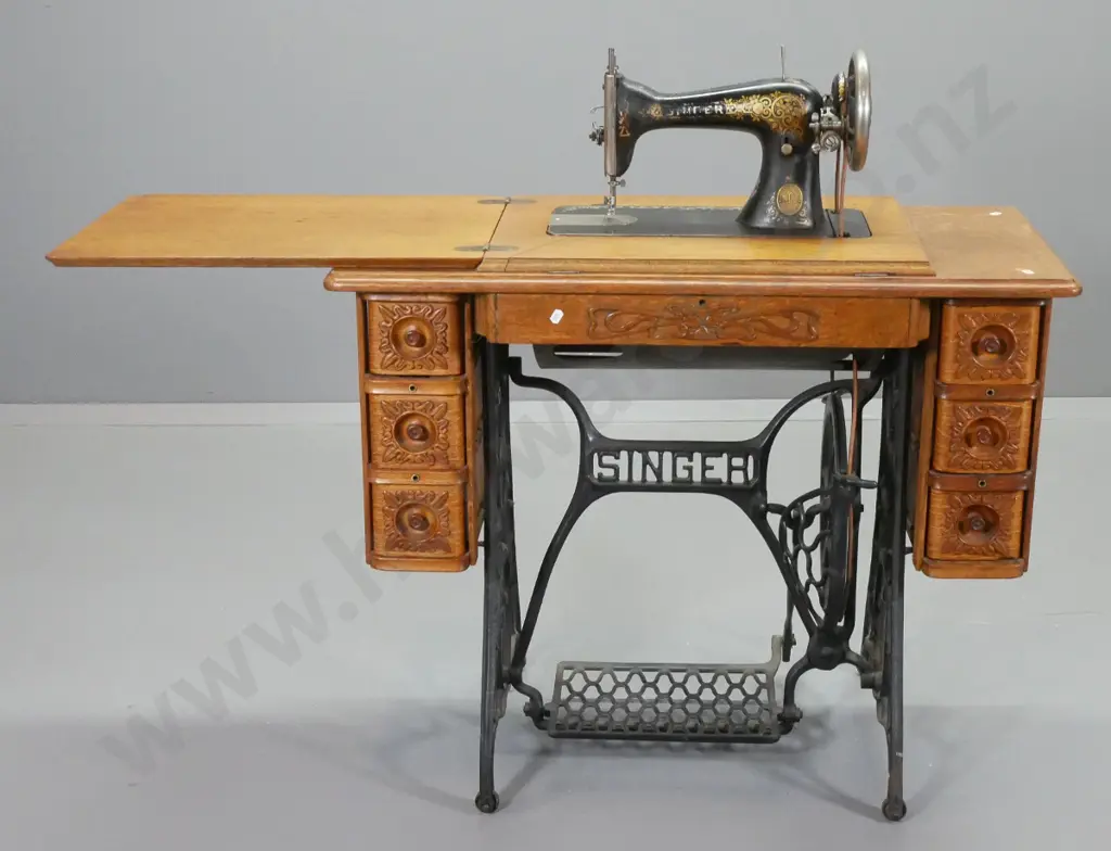 vintage Singer treadle sewing machine in 6-drawer oak case on cast iron base H770 W920 D460 closed Image 1++