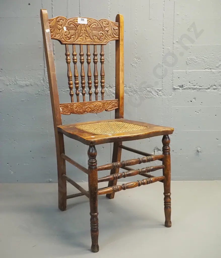 vintage dining chair with spindle back, carved rails, woven cane seat H940 W410 D440 Image 1++