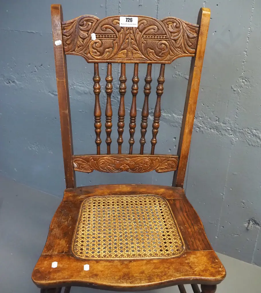 vintage dining chair with spindle back, carved rails, woven cane seat H940 W410 D440 Image 1++