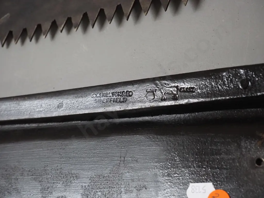 vintage saw marked Disston L-880 and a timber handled hay knife with Skelton & Co Sheffield mark Image 1++