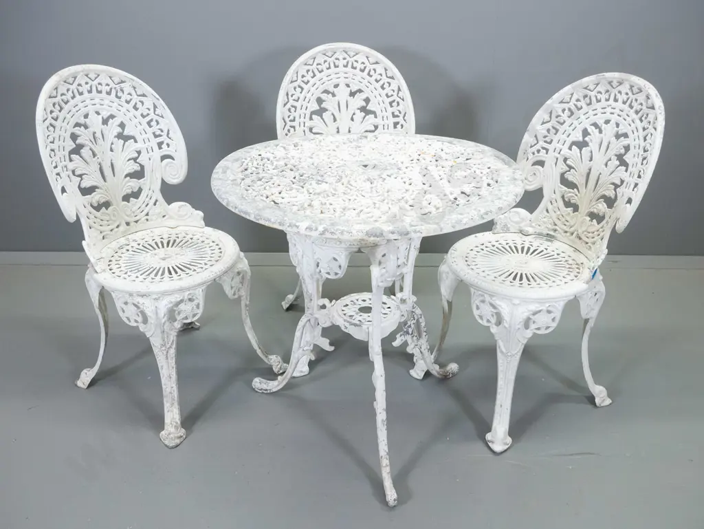 white painted cast alloy patio table and 3 chairs - paint needs some attention H-700 D-690 Image 1++