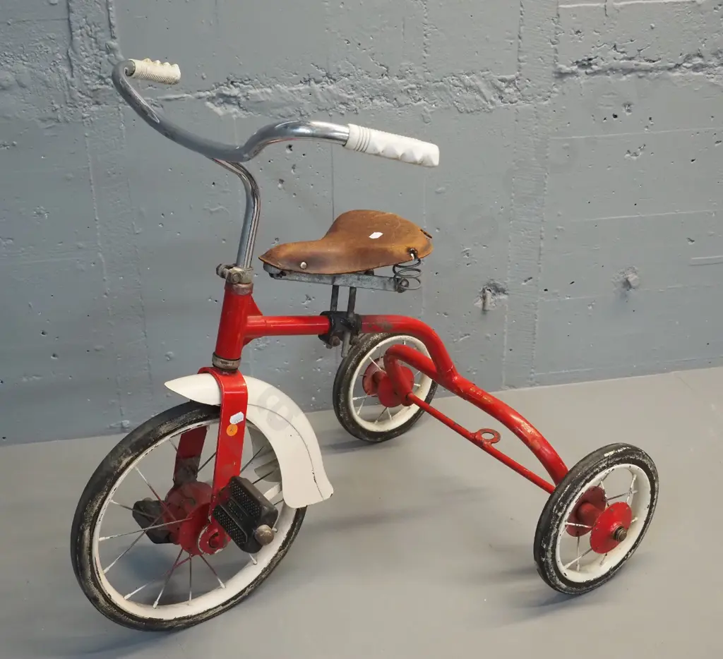 vintage child's trike with sprung leather seat, Flyer markings on pedals, some pitting to chrome H640 L700 W480 Image 1++