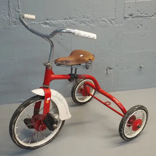 vintage child's trike with sprung leather seat, Flyer markings on pedals, some pitting to chrome H640 L700 W480