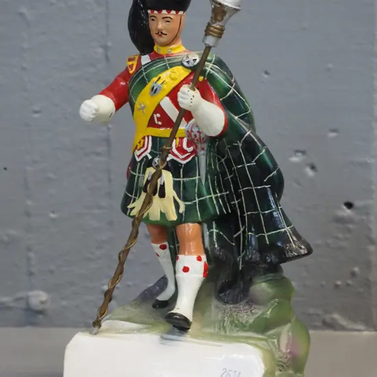 whisky advertising Scottish piper display figure H-250 (logo missing but likely Dewar's)