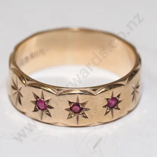 9ct ring with 3 rubys stamped 9ct