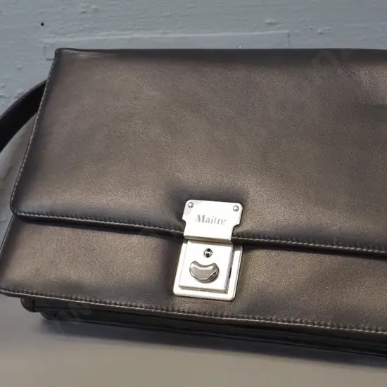 Maitre black leather clutch bag in as-new condition H-170 L-260