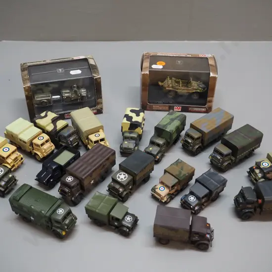 19 unboxed model military vehicles - all Oxford - and 2 boxed German models, one 1:48, one 1:72