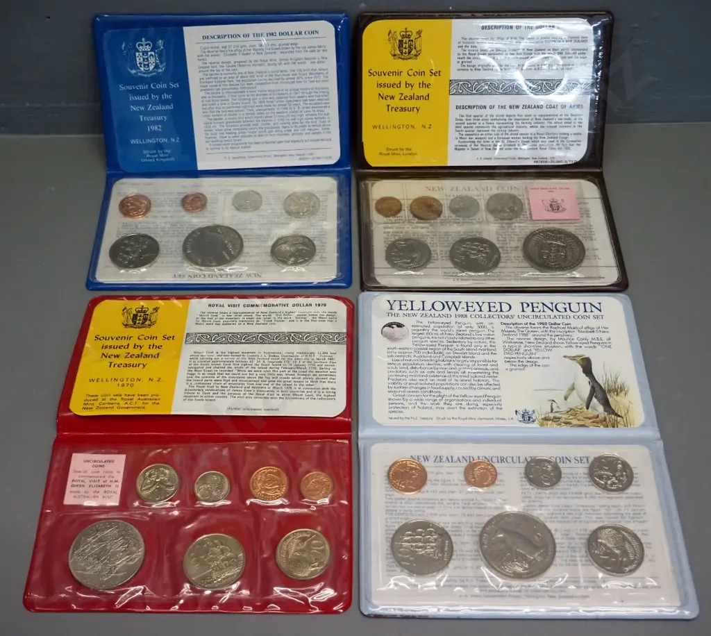 4 New Zealand uncirculated coin sets - 1970, 1982, 1988, souvenir coin set Image 1++