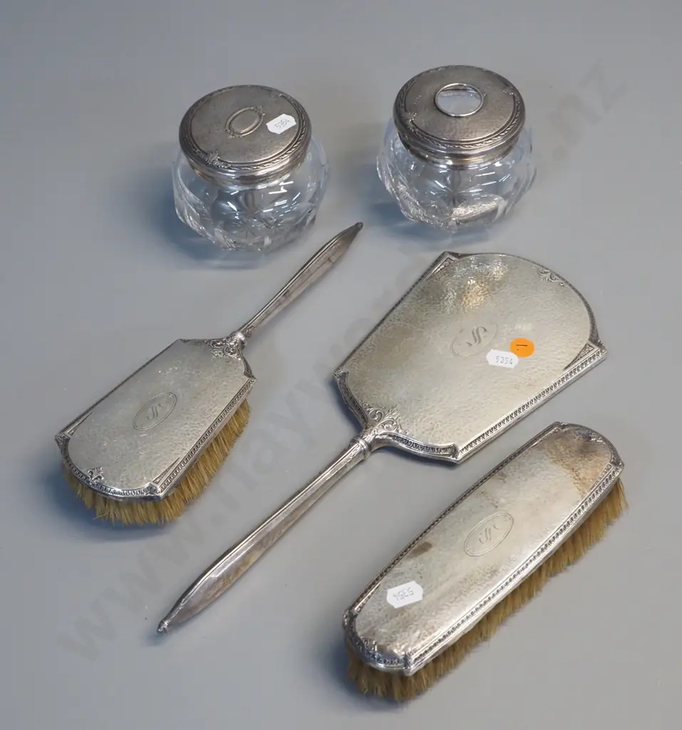 sterling silver dressing table items - 2 brushes, handled mirror, 2 lidded crystal pots, all marked "Sterling' Image 1++