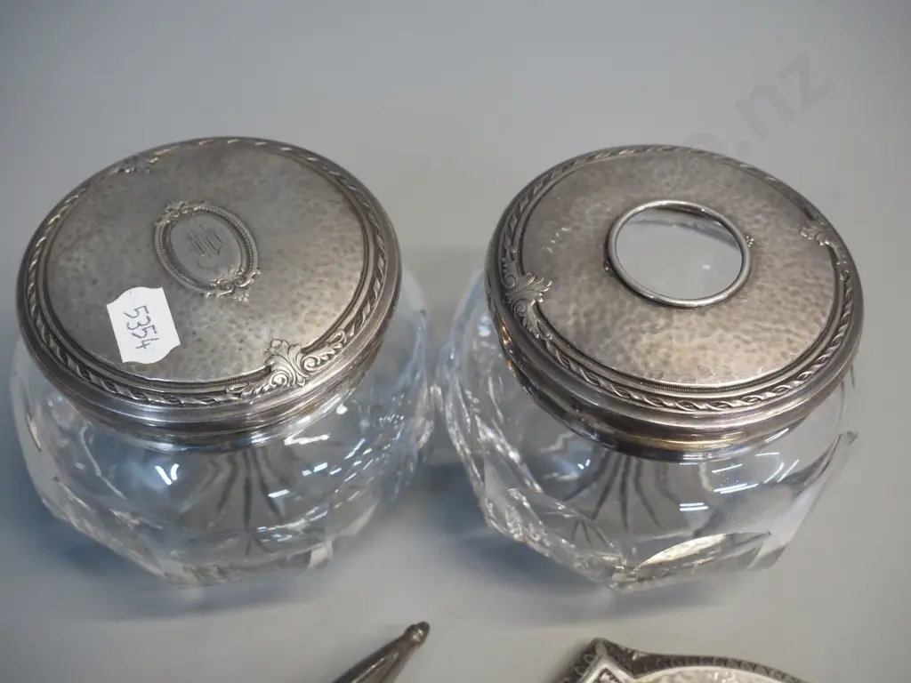 sterling silver dressing table items - 2 brushes, handled mirror, 2 lidded crystal pots, all marked "Sterling' Image 1++