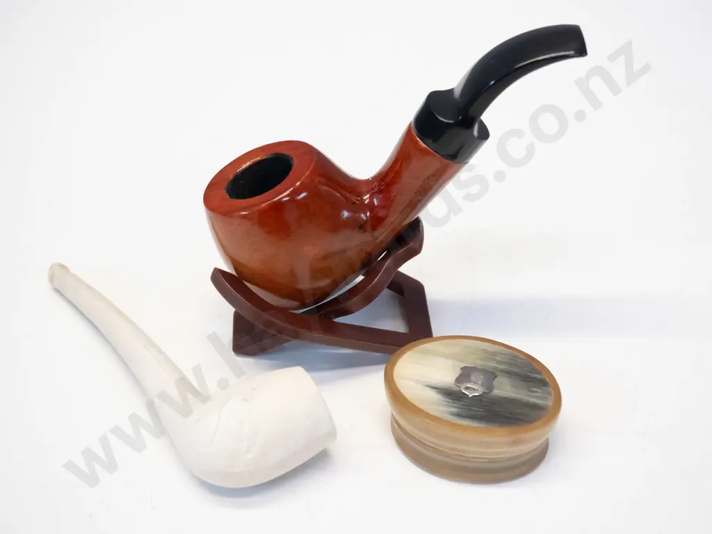 pipe on stand, clay pipe & small bakelite container Image 1++