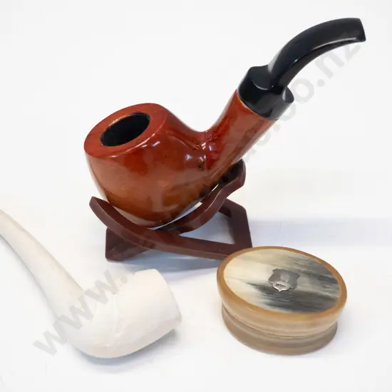 pipe on stand, clay pipe & small bakelite container