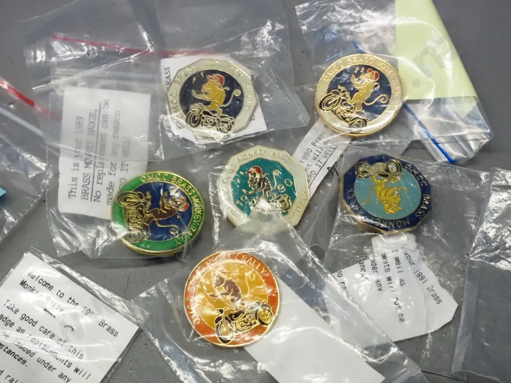 23 OMCC Brass Monkey motorcycle rally badges - years 1985 thru 2001 complete, plus unknowns and a "10 up" badge Image 1++
