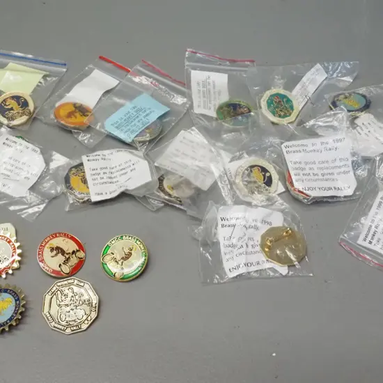 23 OMCC Brass Monkey motorcycle rally badges - years 1985 thru 2001 complete, plus unknowns and a "10 up" badge
