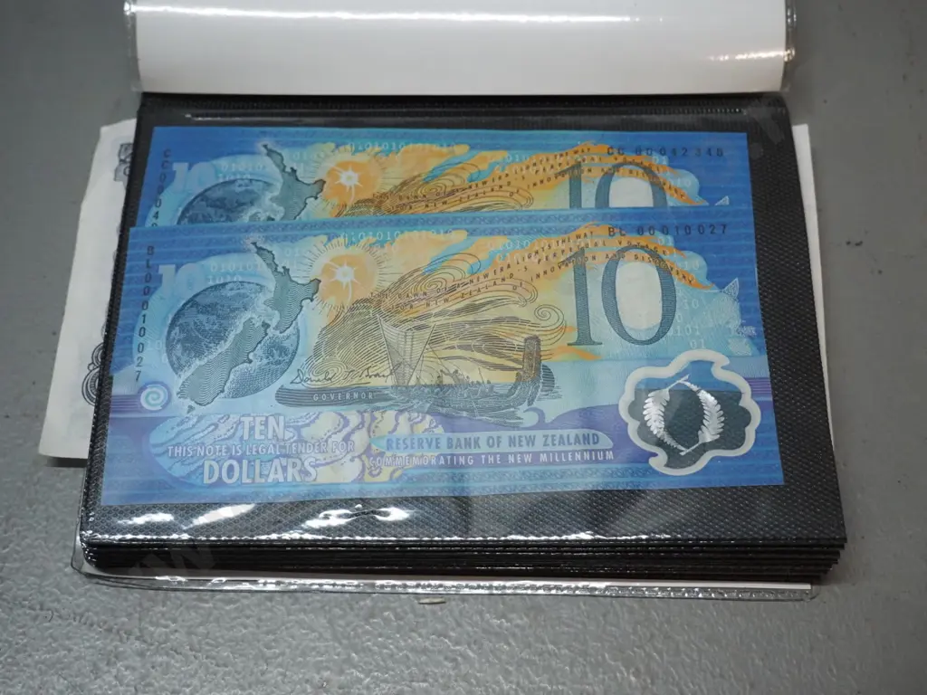 plastic wallet of New Zealand bank notes - 1 and 5 pound notes, Millennium $5 and other dollar notes, etc. Image 1++