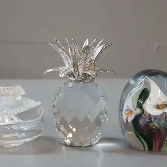 Lalique glass perfume bottle w/stuck stopper and chip, Swarovski pineapple candle holder and a Viesnik art glass arum