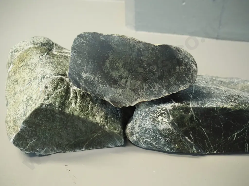 3 pieces of pounamu, each with one polished side, largest is H-120 L-160 Image 1++
