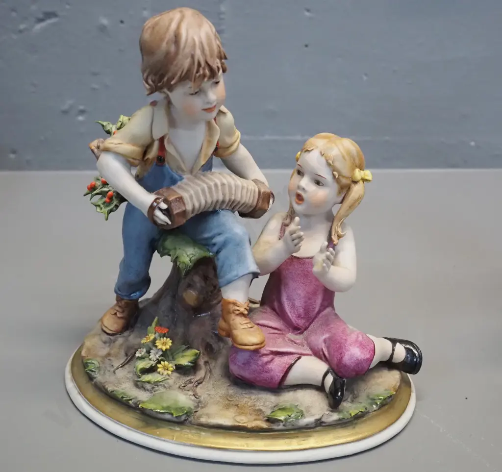 2 Italian soft porcelain hand-painted figurines - children playing. Larger is H-190 W-240 Image 1++
