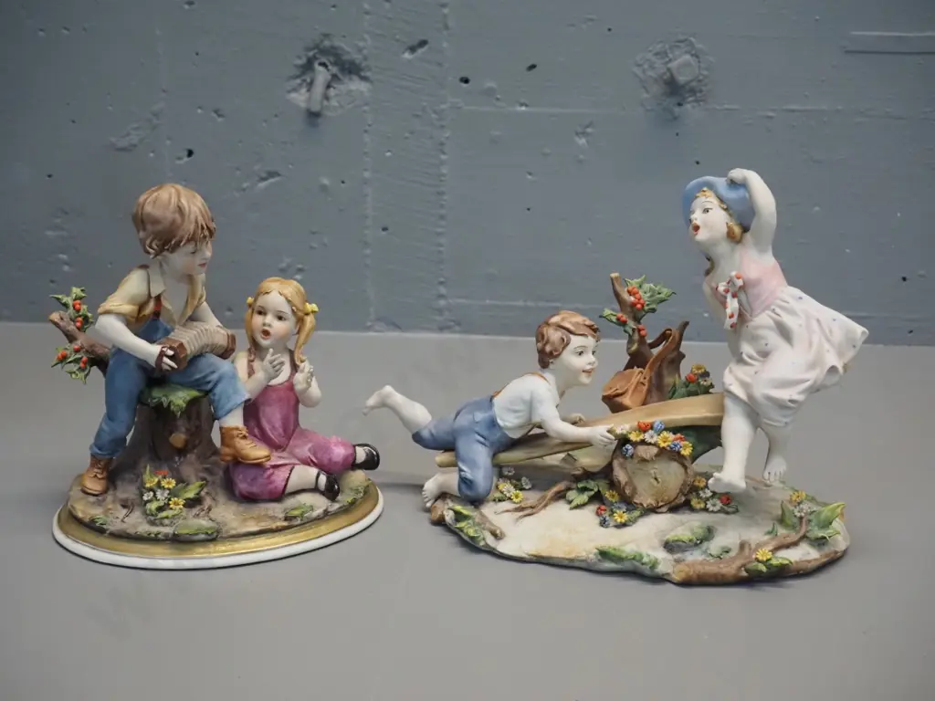 2 Italian soft porcelain hand-painted figurines - children playing. Larger is H-190 W-240 Image 1++