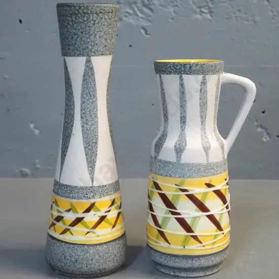 2 small German pottery vases with yellow interior, yellow green and brown motifs, taller is H-250