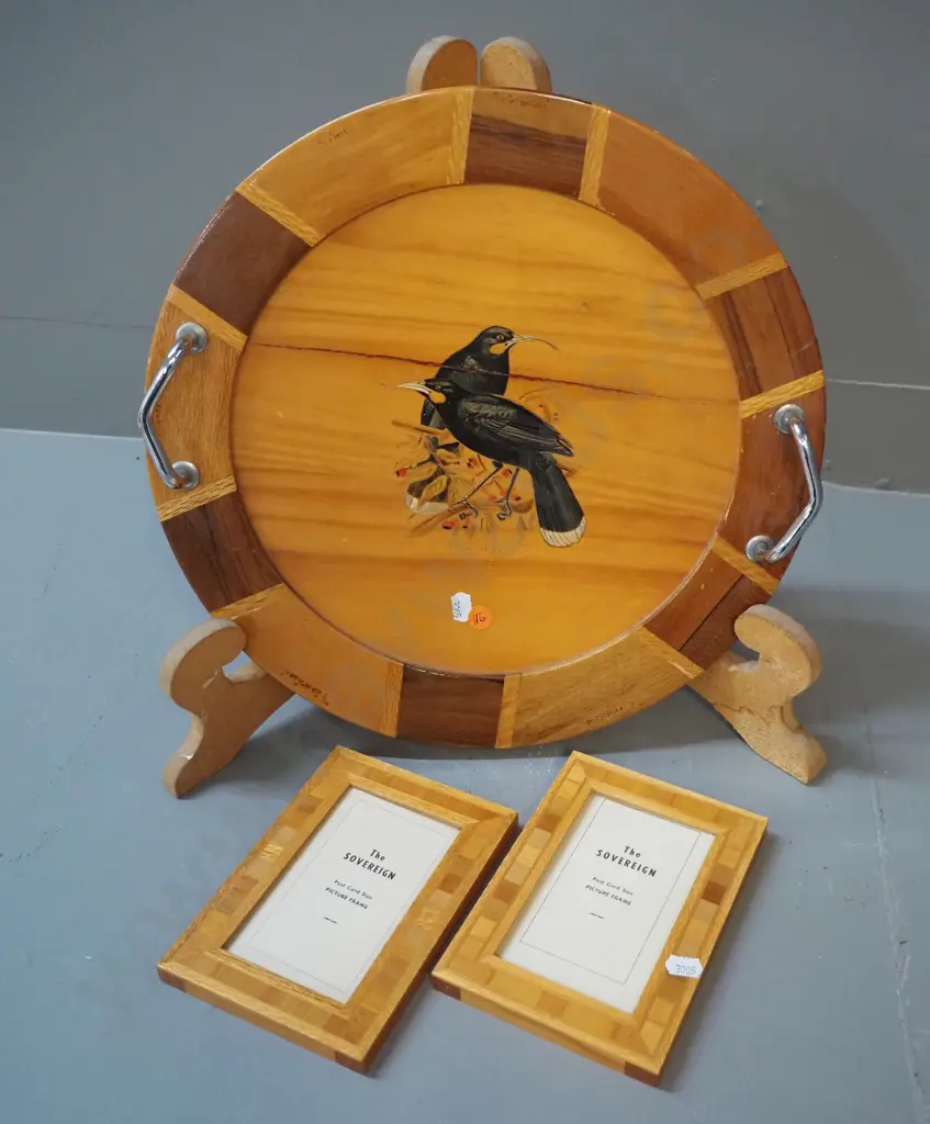 3 pieces Sovereign New Zealand timber ware - chrome-handled tray with tui design (crack) D-370 and 2 picture frames Image 1++