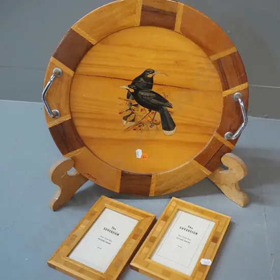 3 pieces Sovereign New Zealand timber ware - chrome-handled tray with tui design (crack) D-370 and 2 picture frames