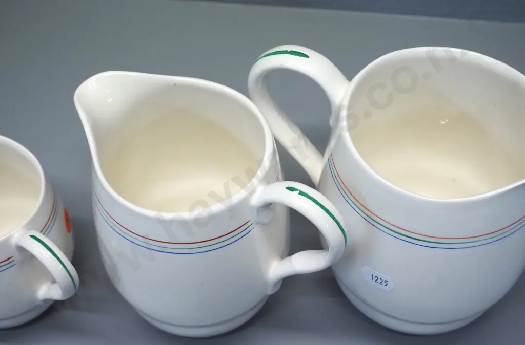 graduated set of 3 Crown Lynn jugs with multi-colour pinstripes - largest is H-160 Image 1++