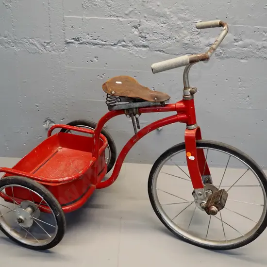 vintage child's trike with sprung leather seat, Flyer markings on pedals, back tray - some corrosion & wear H700 L860