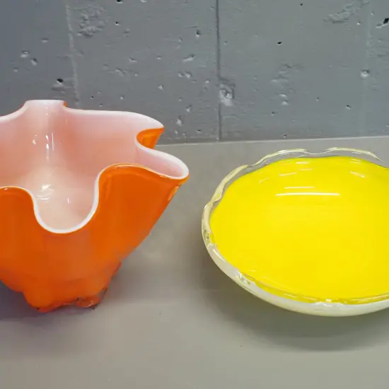 2 art glass bowls - yellow with white outer and orange handkerchief style with white lining H140 D210