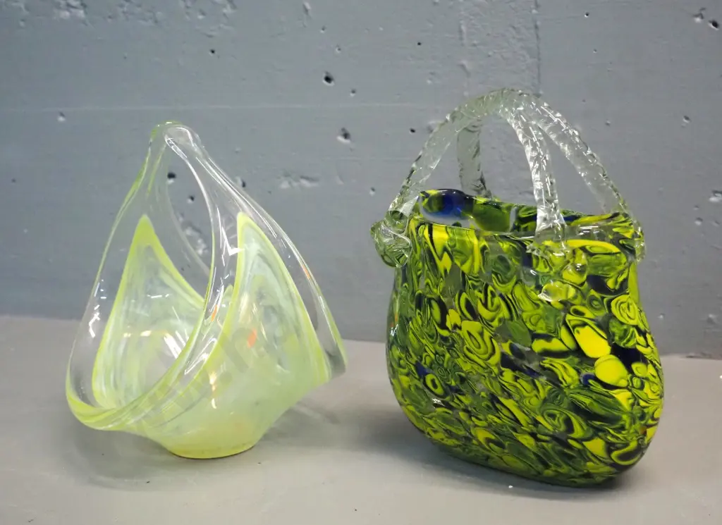 2 pieces of art glass - light green Hokitika basket vase H210 W170 and a green, yellow & blue mottled handbag Image 1++