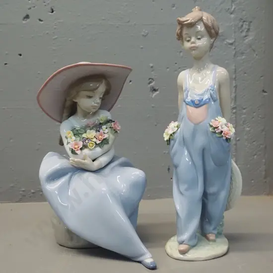 2 Lladro figurines - boy H-270 and girl with flowers