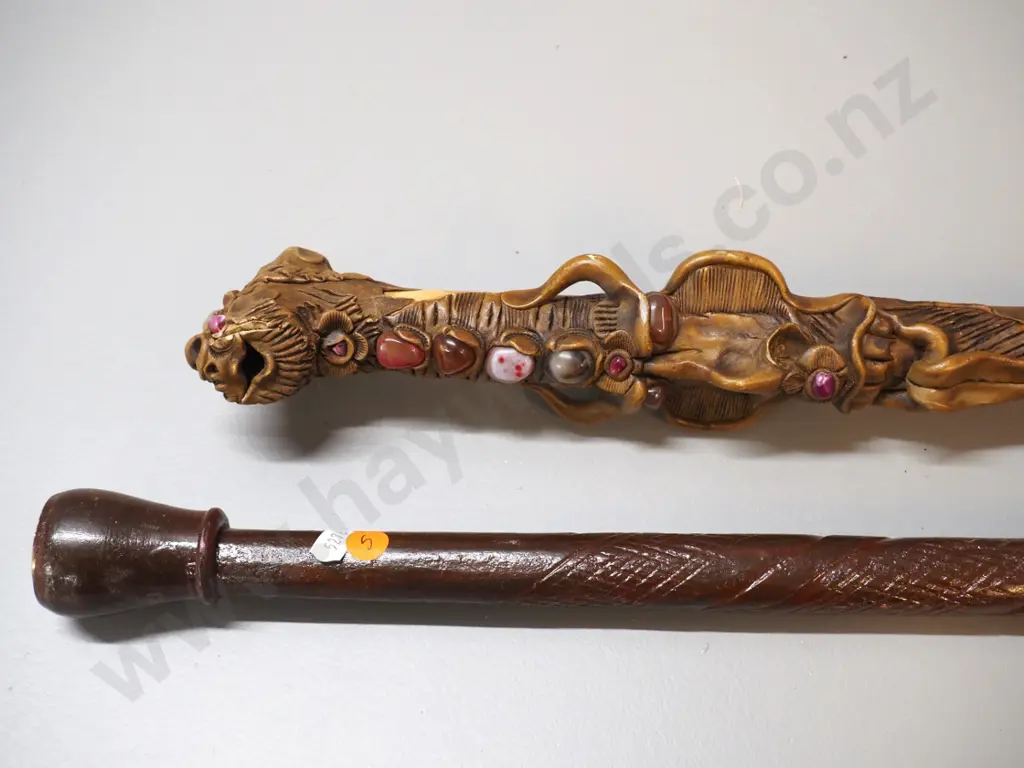 2 walking sticks - carved wood with  fantasy theme applied composite and stone, other carved wood with compass on top Image 1++