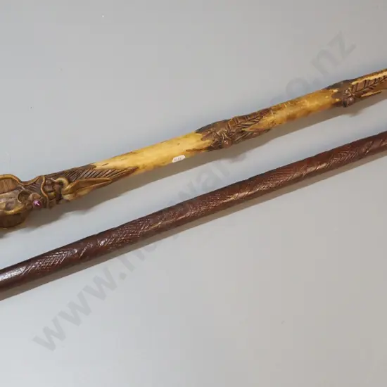 2 walking sticks - carved wood with  fantasy theme applied composite and stone, other carved wood with compass on top