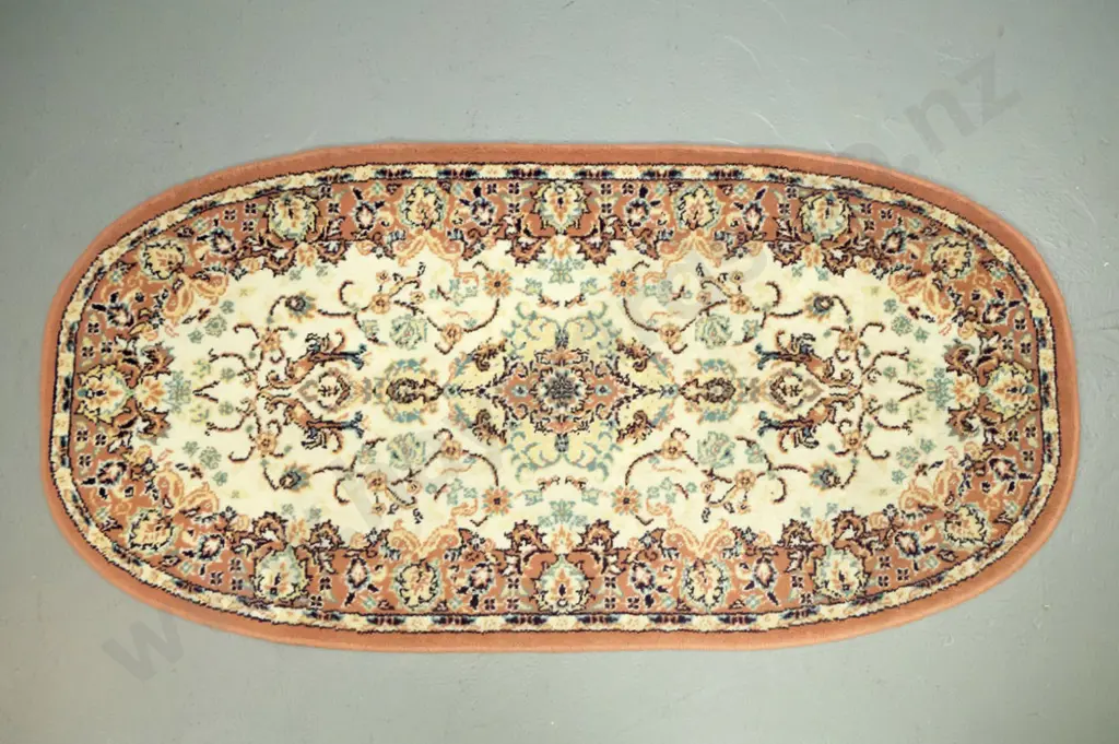 2 small Persian style wool floor rugs - edged oval piece slightly faded, other slightly longer L970 W510 Image 1++