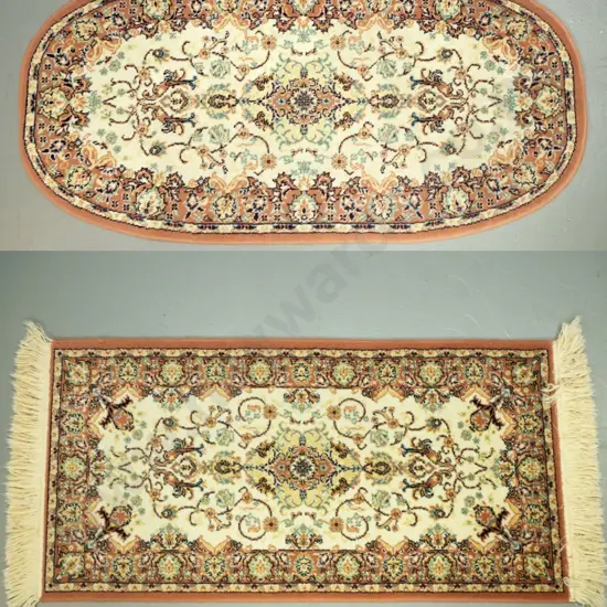 2 small Persian style wool floor rugs - edged oval piece slightly faded, other slightly longer L970 W510