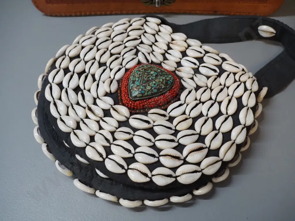 2 handbags - black cloth with shells & beads and hand-tooled (Mexican?) leather w/eagle and Aztec or Mayan motifs Image 1++