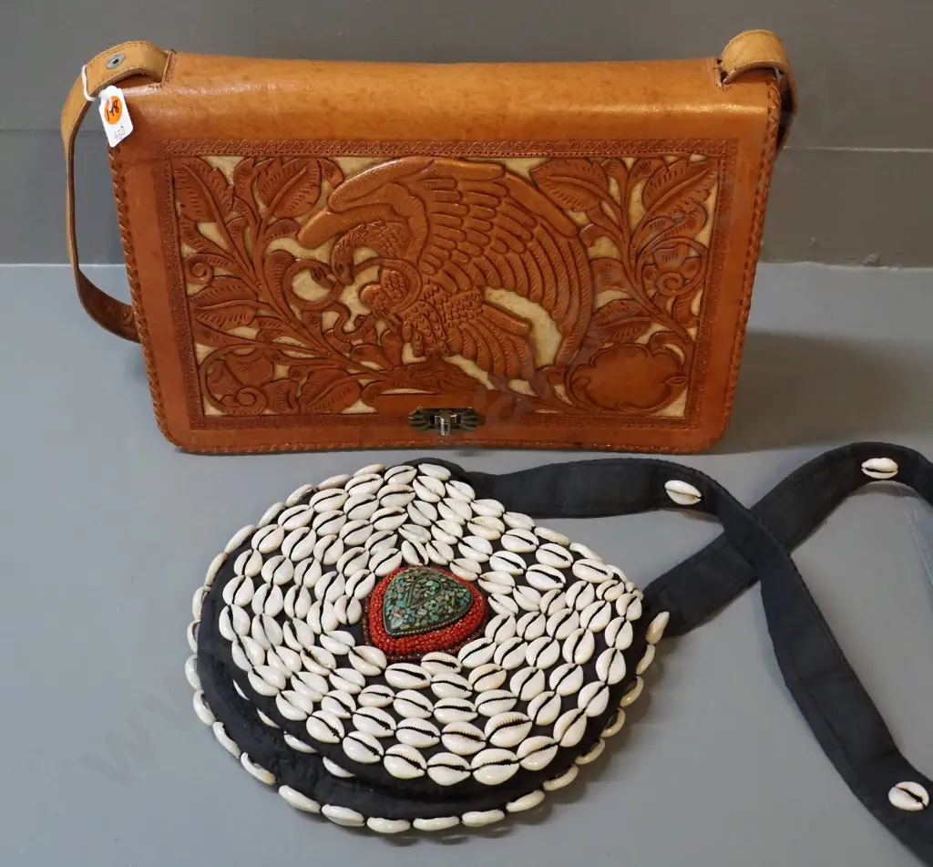 2 handbags - black cloth with shells & beads and hand-tooled (Mexican?) leather w/eagle and Aztec or Mayan motifs Image 1++