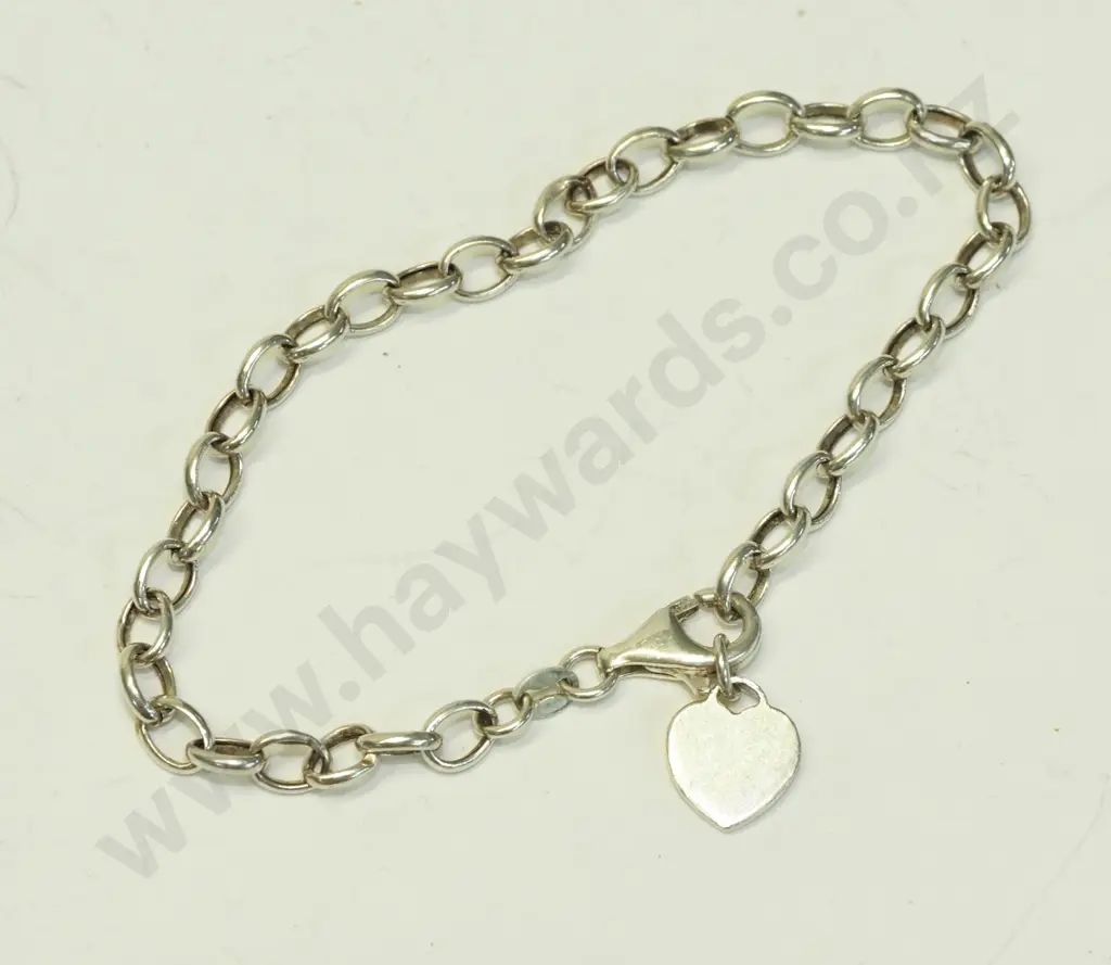 silver bracelet with heart charm stamped 925 Image 1++